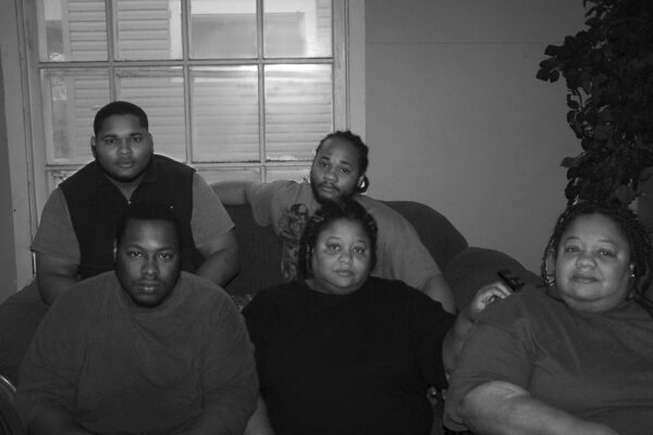 Johnson Family in their home that was stormed by 32 police officers.