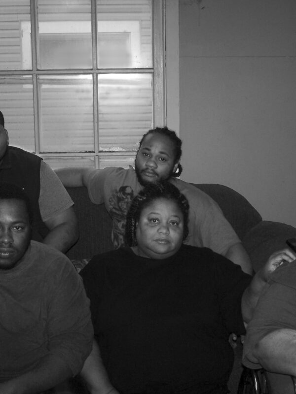 Johnson Family in their home that was stormed by 32 police officers.