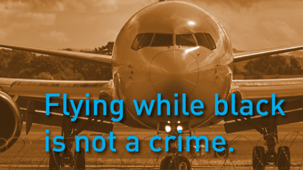 Photo of plane with text "flying while black is not a crime."
