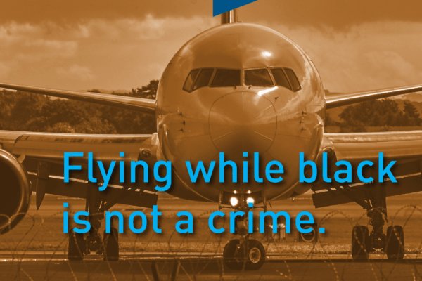 Photo of plane with text "flying while black is not a crime."