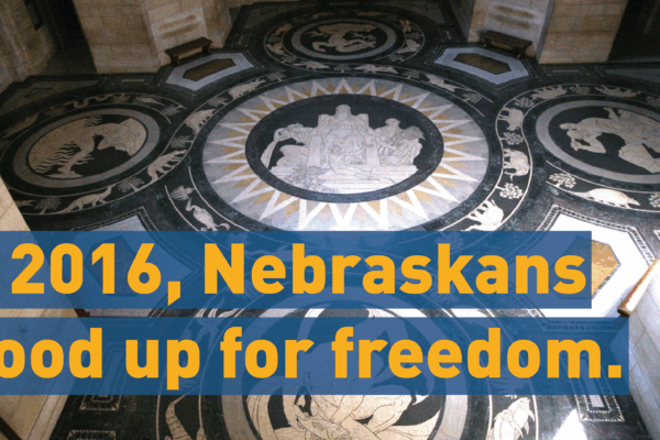 Image of rotunda with text: In 2016, Nebraskans stood up for freedom