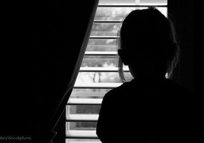 Child looking out window