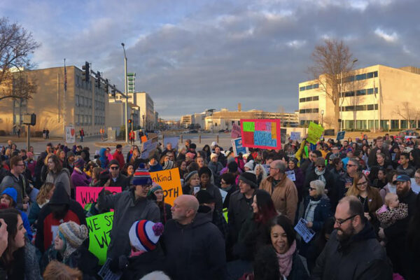 Crowd at solidarity rally for immigrants and refugees