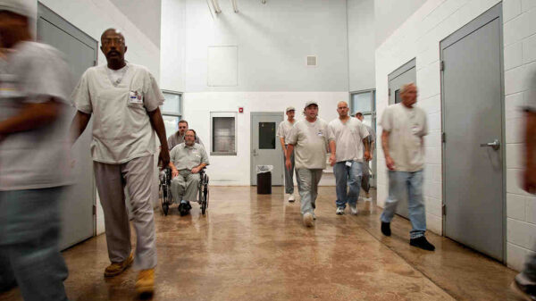 Photo of prisoners in a hallway