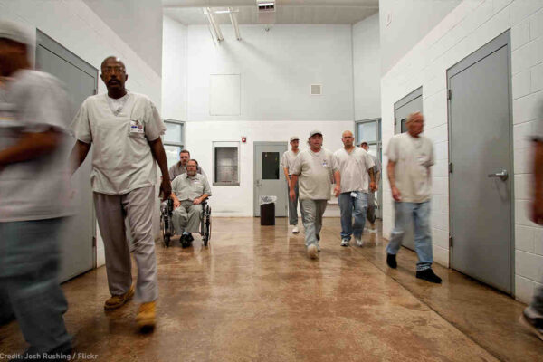 Photo of prisoners in a hallway