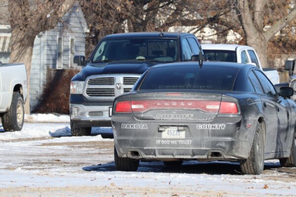 A Dakota County Sheriff's cruiser sits parked outside the courthouse and jail.