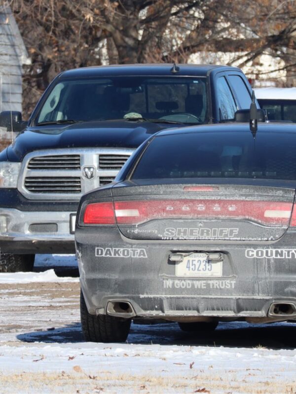 A Dakota County Sheriff's cruiser sits parked outside the courthouse and jail.