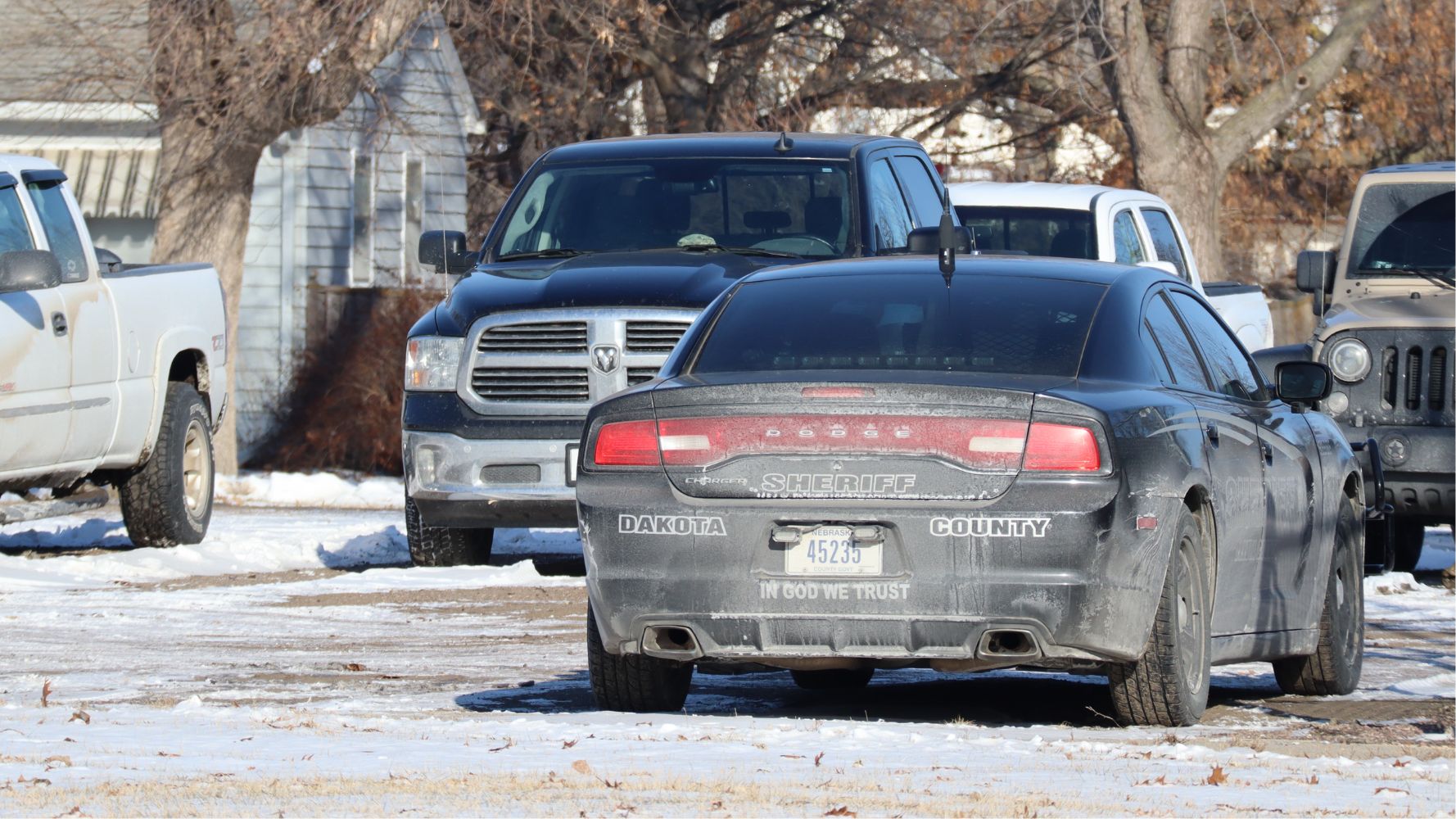 A Dakota County Sheriff's cruiser sits parked outside the courthouse and jail.