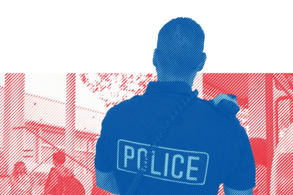 police officer in front of school