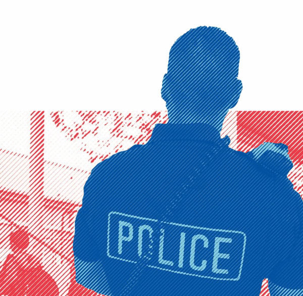 police officer in front of school