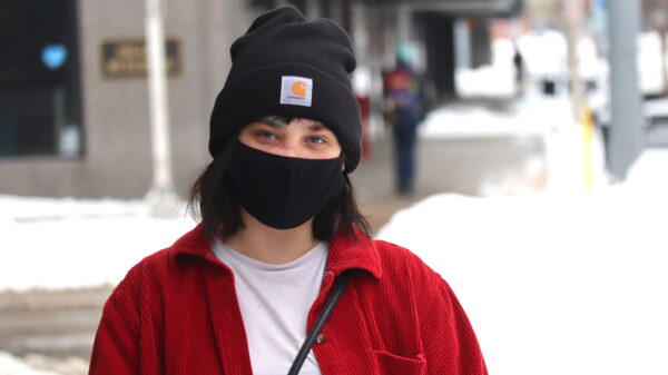 Elise Poole stands in downtown Lincoln.