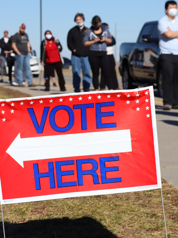 A line of Nebraskans wait to vote.