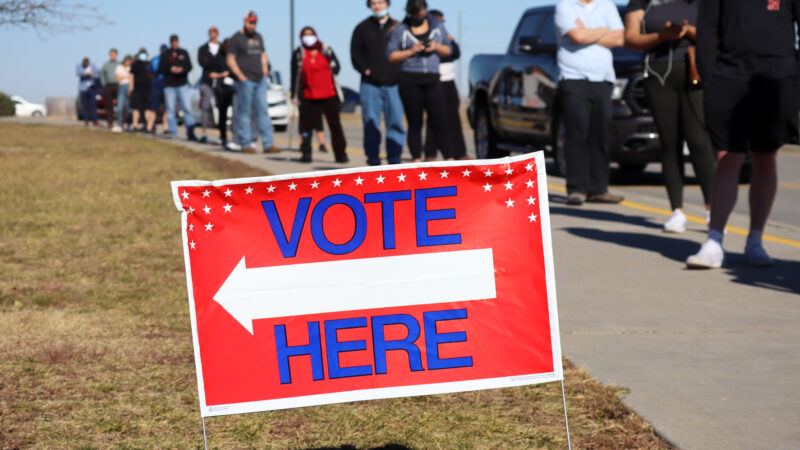 A line of Nebraskans wait to vote.