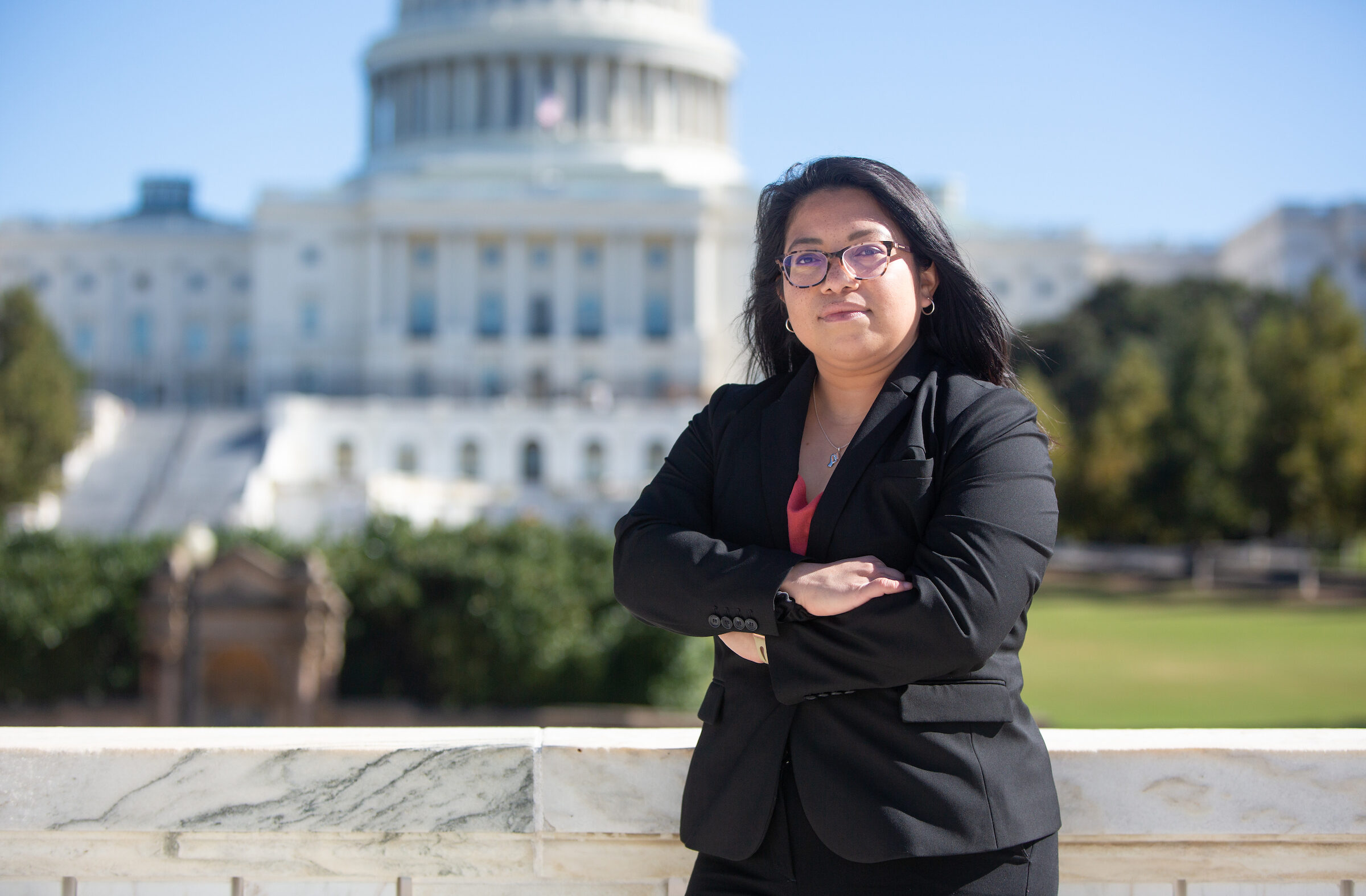 ACLU of Nebraska Interim Legal Director Rose Godinez stands outside the Capitol building.
