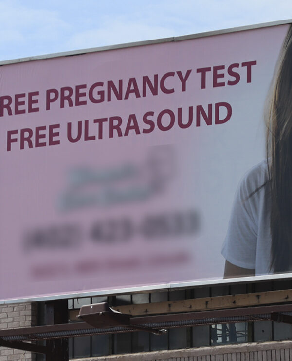 A crisis pregnancy center advertises in Lincoln, promoting free pregnancy tests and ultrasounds.