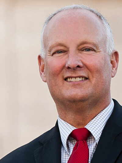 A photograph of Attorney General Peterson, taken from the Attorney General's Office website.