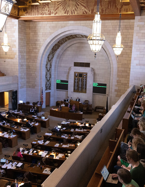 Abortion rights supporters watch debate on abortion ban LB 626 during its first round of debate.