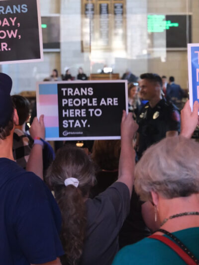 Nebraskans gather in the Capitol to tell state senators to protect trans youth and reject LB 574.