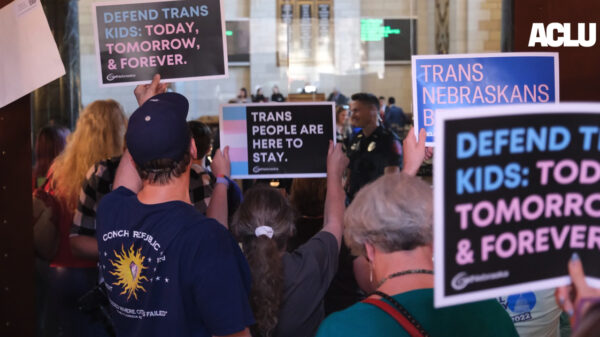 Nebraskans gather in the Capitol to tell state senators to protect trans youth and reject LB 574.