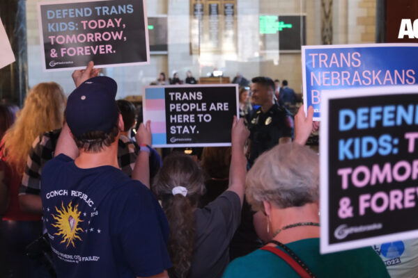 Nebraskans gather in the Capitol to tell state senators to protect trans youth and reject LB 574.