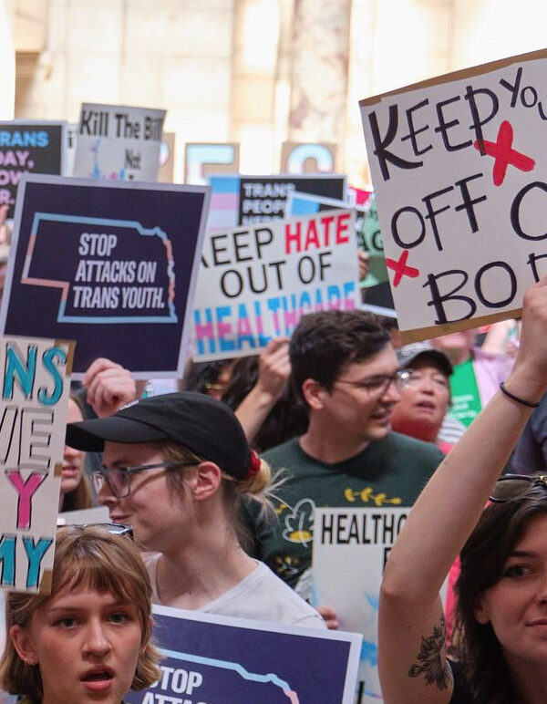 Nebraskans gather in the Capitol to tell state senators to protect trans youth and abortion access during LB 574's first Final Reading debate on Tuesday, May 16. Photo by Chad Greene for the ACLU of Nebraska.