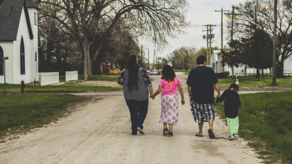 Alice, Norma, and their children walk together in Kilgore, Nebraska