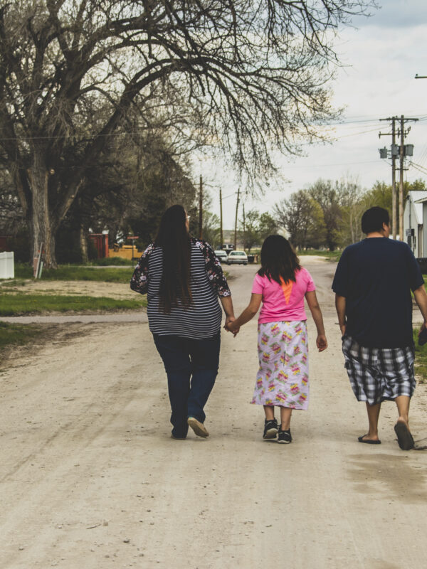 Alice, Norma, and their children walk together in Kilgore, Nebraska