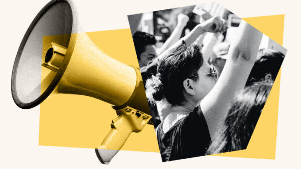 A graphic shows a megaphone and people chanting.