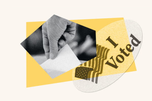A hand holds a ballot next to a sticker reading "I voted."