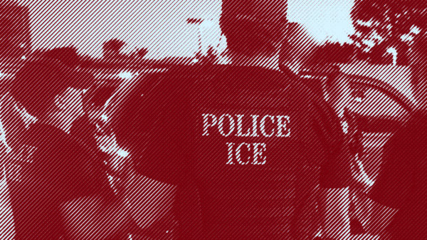 ICE agents talk to each other. One is wearing a vest reading "POLICE ICE"