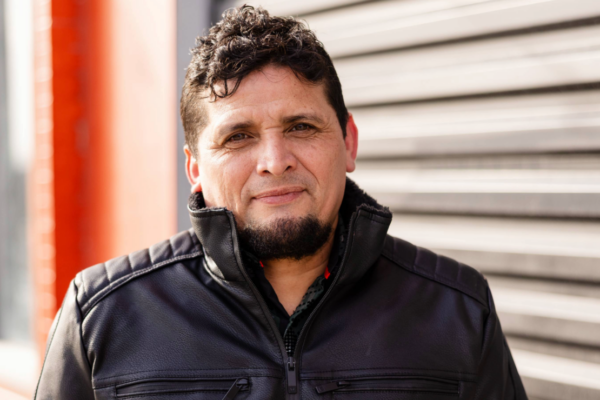 ACLU of Nebraska and CIRA client Jorge Calderon Rivera poses for a photograph in Omaha. Photo courtesy of M. Julie Photos.