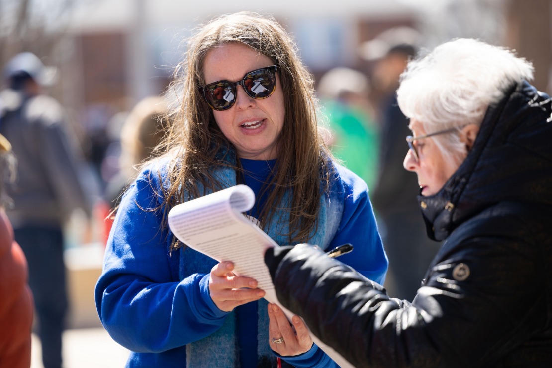 ACLU of Nebraska Executive Director Mindy Rush Chipman collects signatures for the Respect Nebraska Voters campaign.
