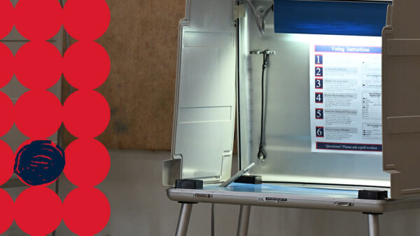 A polling place with a stylized red circle graphic on the side.
