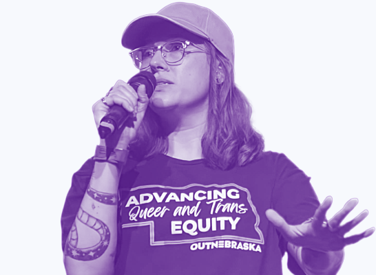 A stylized image of a speaker holding out a hand wearing a shirt reading Advancing Queer and trans equity.