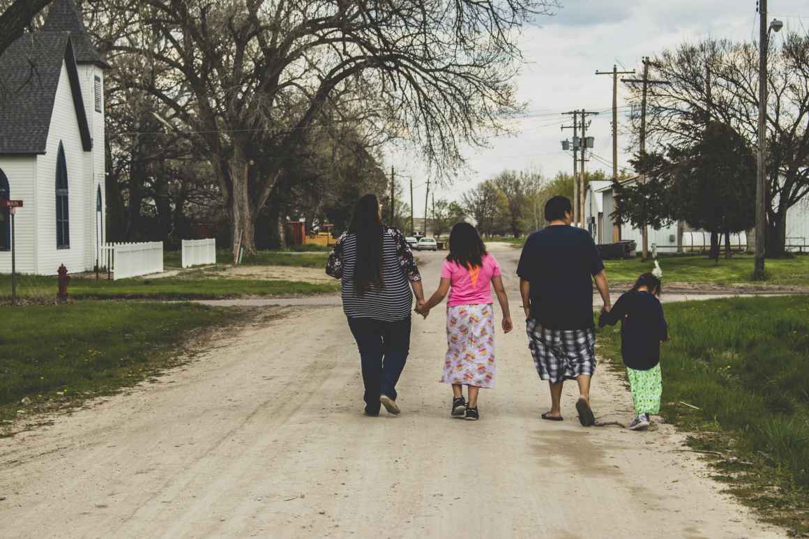 Alice, Norma, and their children walk together in Kilgore, Nebraska 