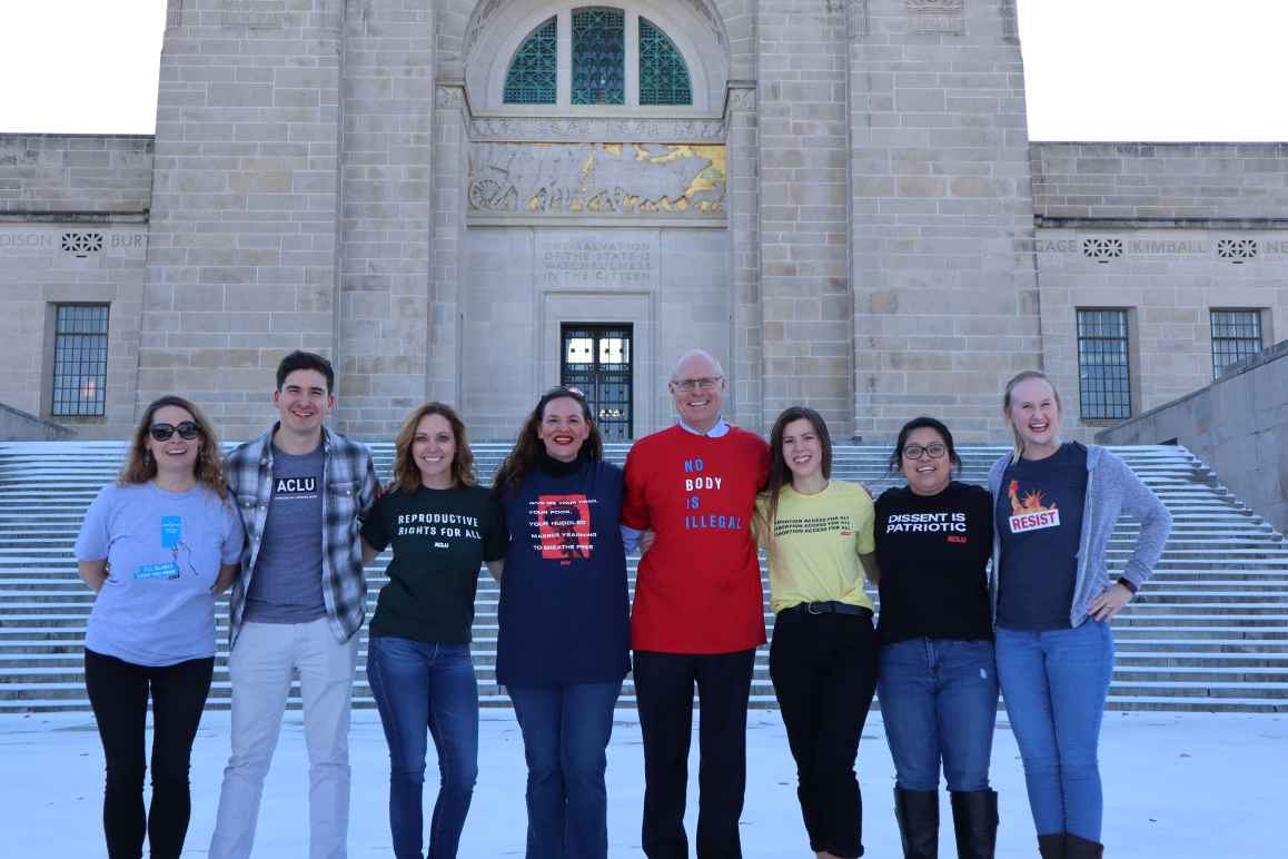 The ACLU of Nebraska team stands in front of the Capitol.