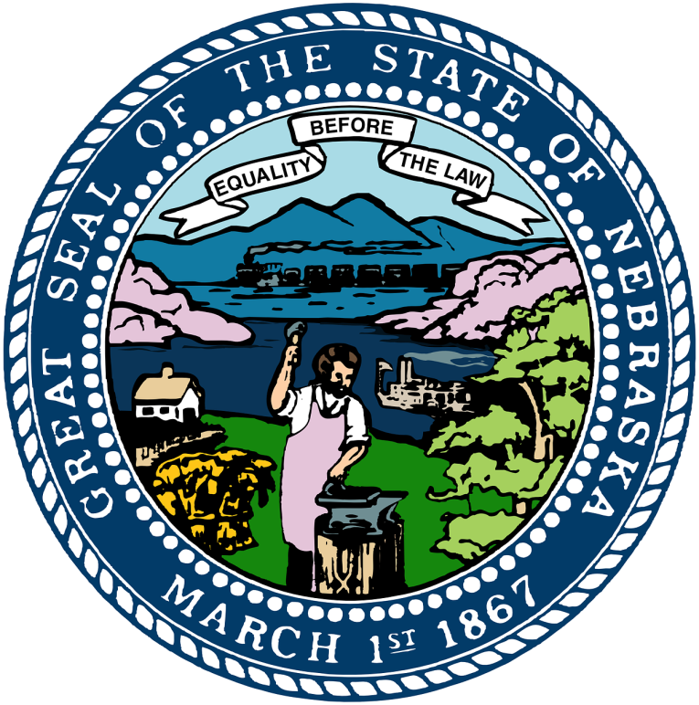 A landscape featuring Sandhills, a train, the Missouri River, a tree, wheat, a house, a steamboat, and blacksmith. A banner in the sky says "Equality Before the Law". A blue circle border, in white "Great Seal of the State of Nebraska March 1st 1867"