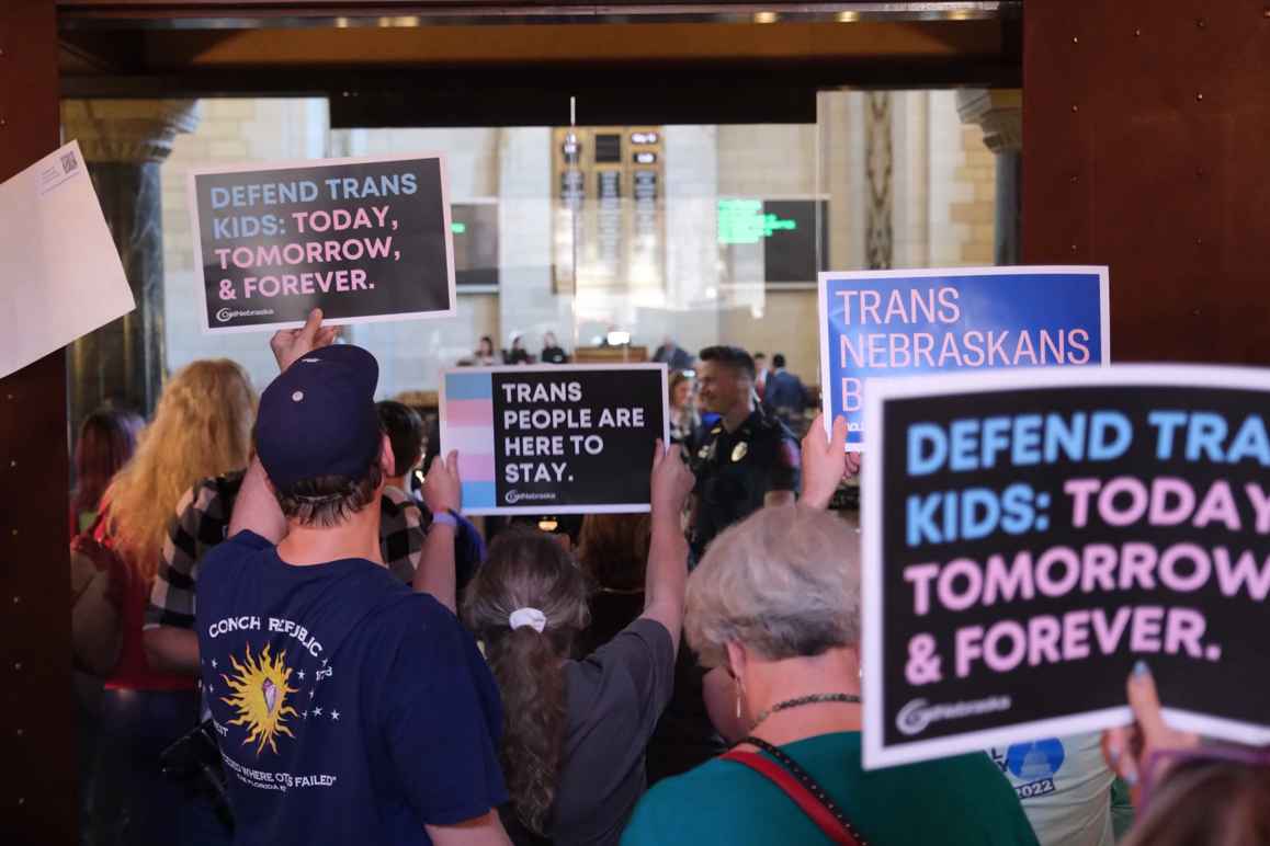 Nebraskans gather in the Capitol to tell state senators to protect trans youth and reject LB 574.