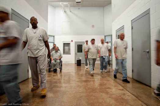 Photo of prisoners in a hallway