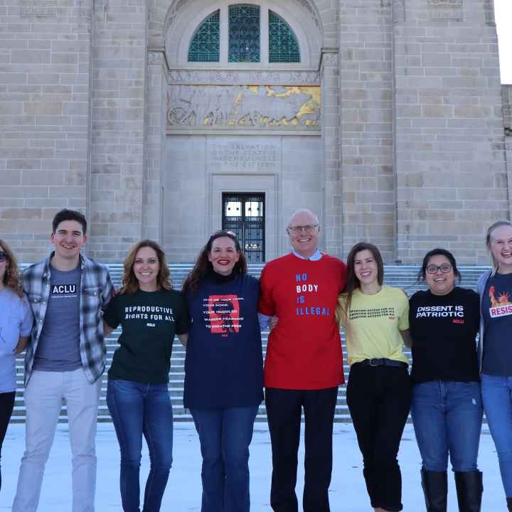 The ACLU of Nebraska team stands in front of the Capitol.