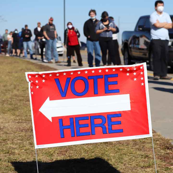 A line of Nebraskans wait to vote.